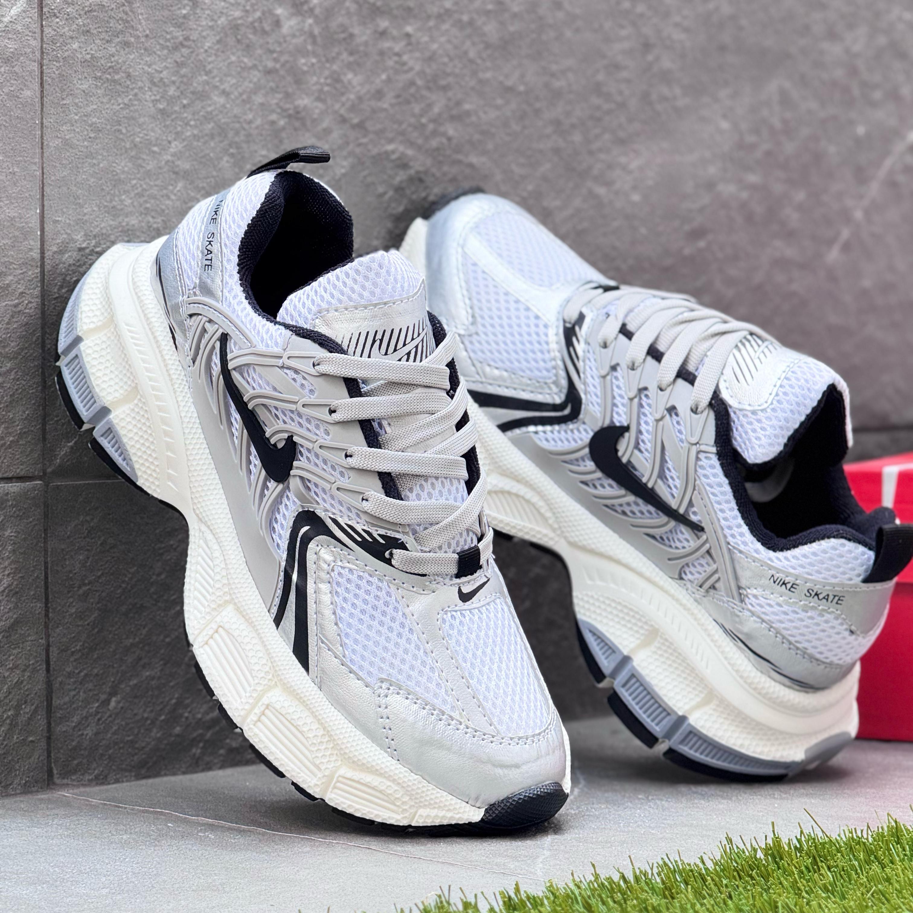 NIK SKATE GRIS X BLANCO
